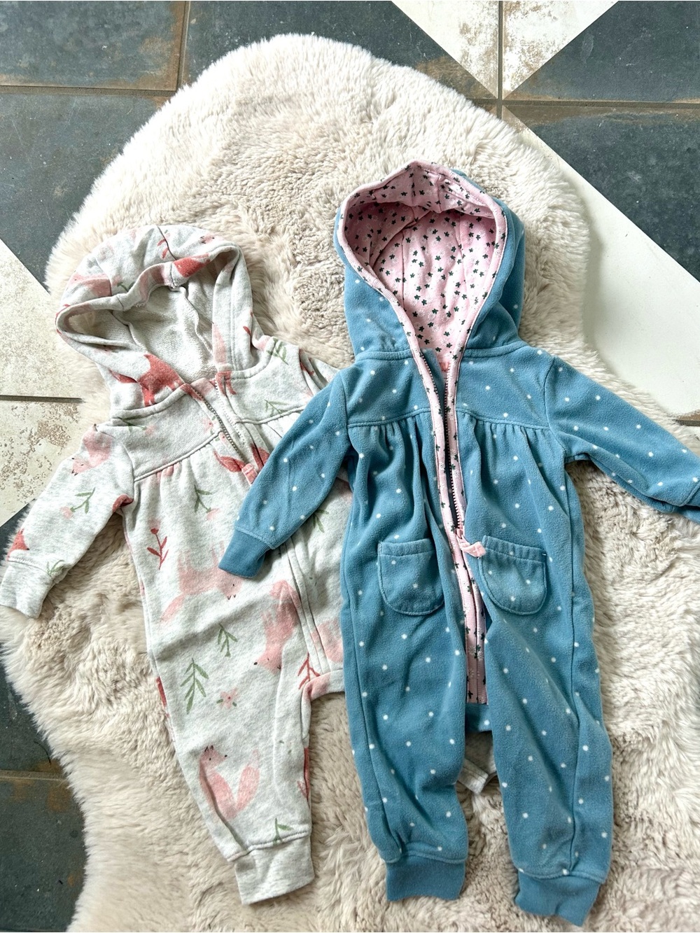 Two full body fox onesies